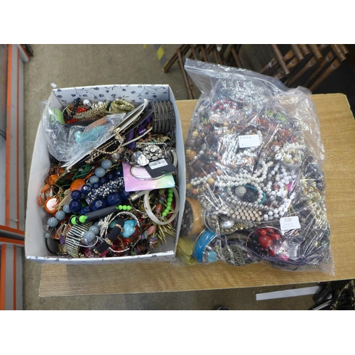 2125 - A large bag and box of costume jewellery