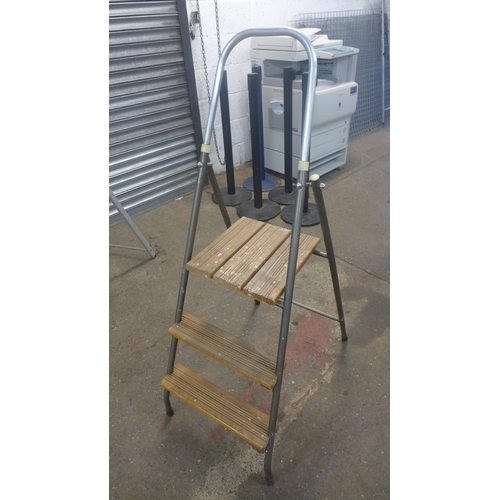 2220 - Two sets of 3-rung stepladders and a set of 6-rung stepladders