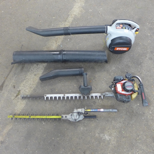 2243 - A Ryobi petrol leaf blower - W and a petrol Kawasaki Kits 750A hedge cutter, a/f