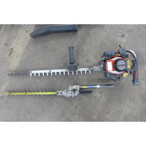 2243 - A Ryobi petrol leaf blower - W and a petrol Kawasaki Kits 750A hedge cutter, a/f