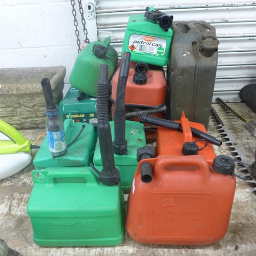 2244 - A metal Jerry can and 10 petrol cans