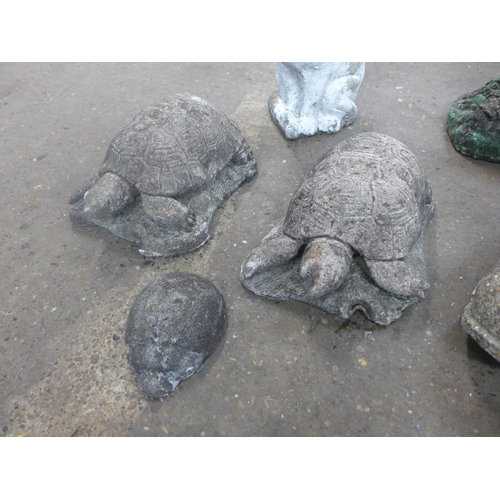 2248 - 7 Stone garden figures- Cat, two turtles, hedge hog, boot ,frier, and old man on bench