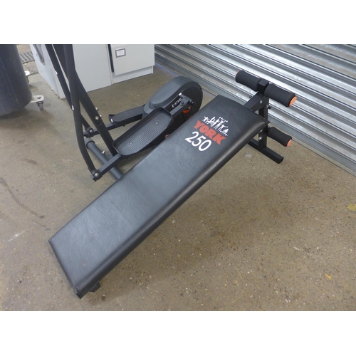 2265 - A quantity of gym equipment including a York 250 weights/exercise bench, an E-Strider E1660 cross tr... 