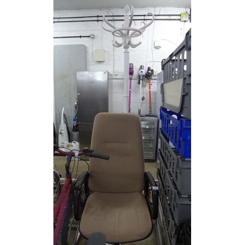 2202 - A brown fabric office chair and a hat rack