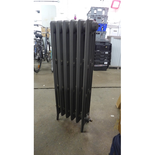 2410 - A cast iron radiator, approximately 400mm x 950mm