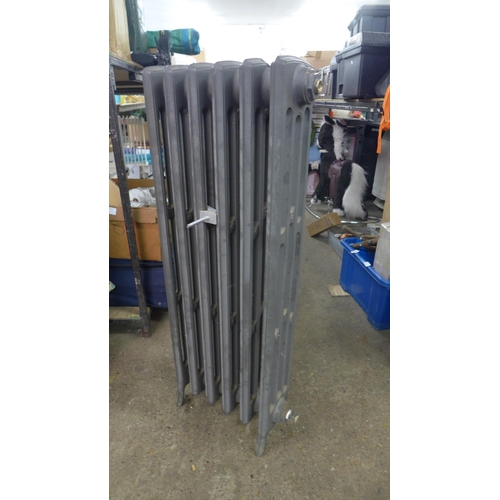 2410 - A cast iron radiator, approximately 400mm x 950mm