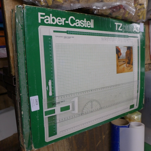 2419 - A Faber-Castell TZ-Plus A3 drawing board in original box and a BH England professional quality adjus... 