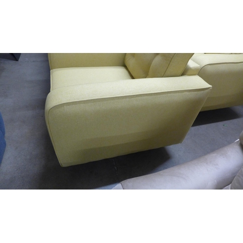 1367 - A set of mustard upholstered button backed three seater, two seater sofas and an armchair