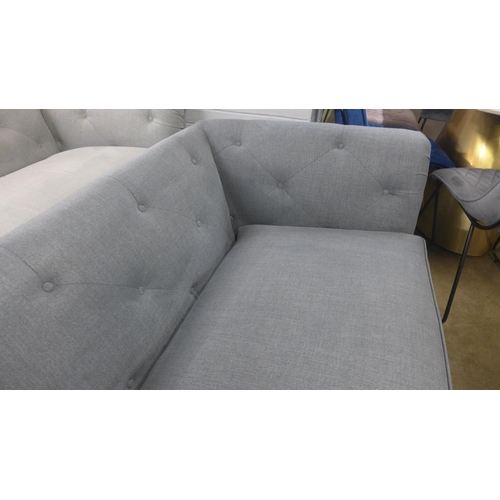1383 - A mid grey upholstered modern Chesterfield style large three seater sofa