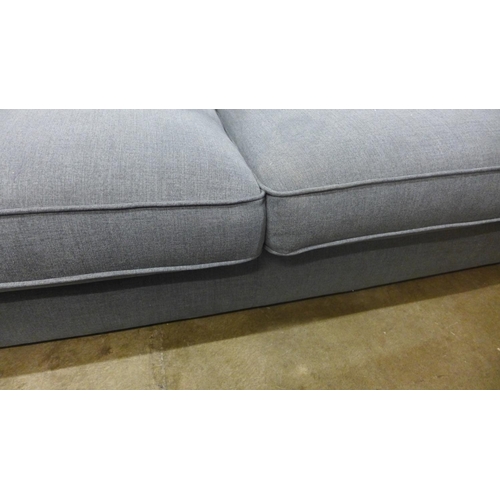 1383 - A mid grey upholstered modern Chesterfield style large three seater sofa