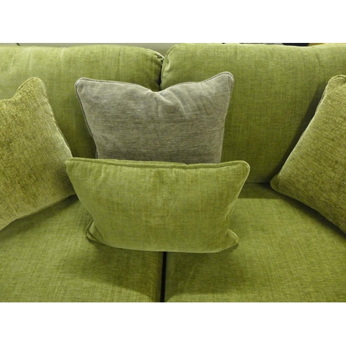 1398 - An Abingdon four seater sofa in moss green, RRP £2,199
