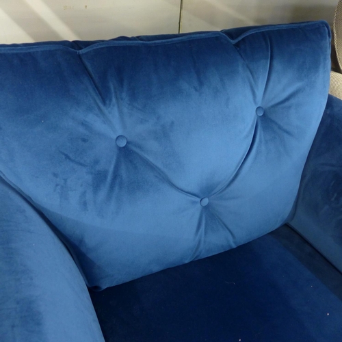 1432 - A Hoxton blue velvet upholstered armchair