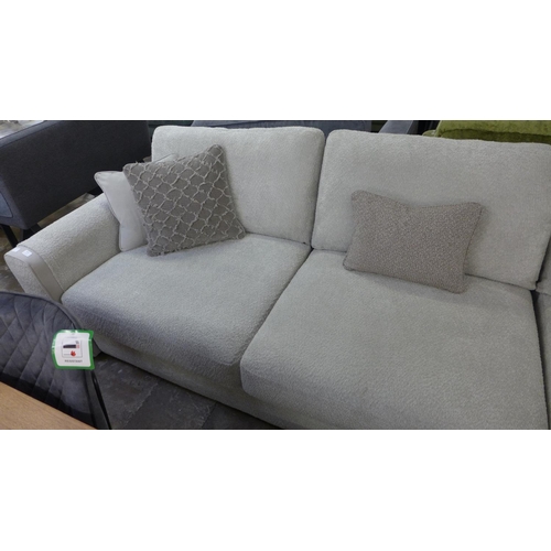 1452 - A grey fabric upholstered corner sofa with patterned scatter cushions RRP £6199