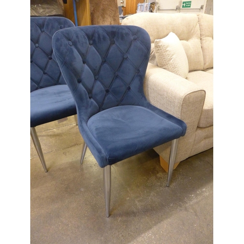 1466 - A pair of blue velvet upholstered buttoned back dining chairs * this lot is subject to VAT