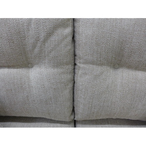 1467 - An oatmeal textured weave upholstered 2.5 seater sofa