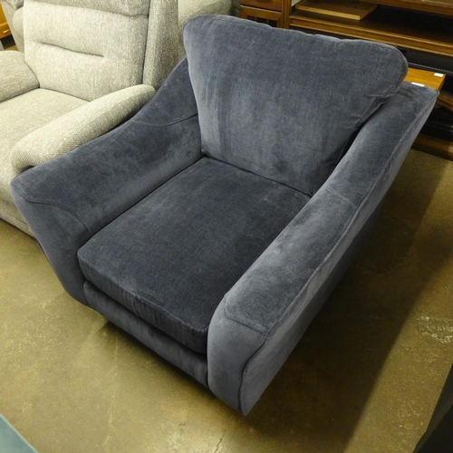 1470 - A midnight blue velvet upholstered armchair