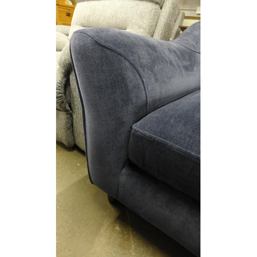 1470 - A midnight blue velvet upholstered armchair