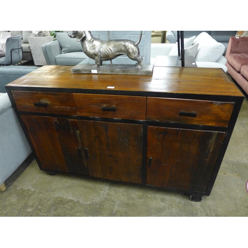 1491 - An industrial style hardwood and metal three door, three drawer cabinet on wheels * this lot is subj... 