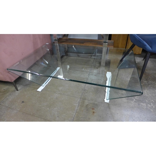 1494 - A heavy glass coffee table