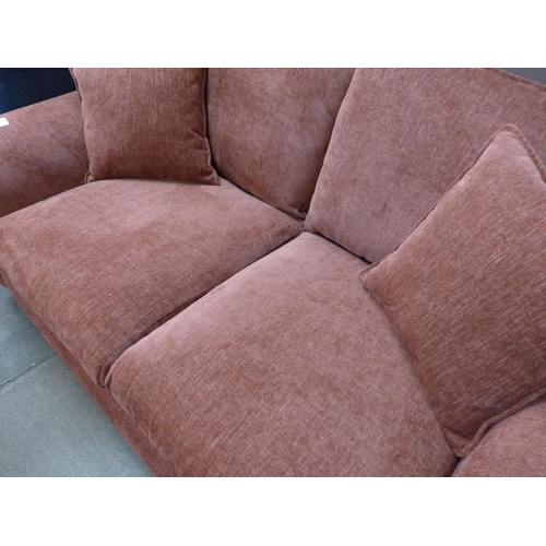 1497 - A dusty red textured velvet upholstered two seater sofa