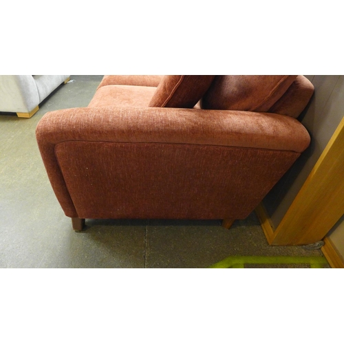 1497 - A dusty red textured velvet upholstered two seater sofa