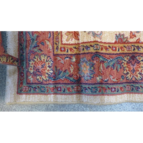 1503 - A small gold ground 100% wool pile Turkish rug