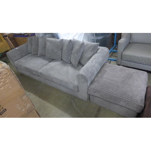 1544 - A grey jumbo cord three seater sofa and mink footstool