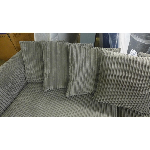 1544 - A grey jumbo cord three seater sofa and mink footstool