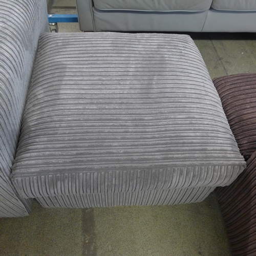 1544 - A grey jumbo cord three seater sofa and mink footstool