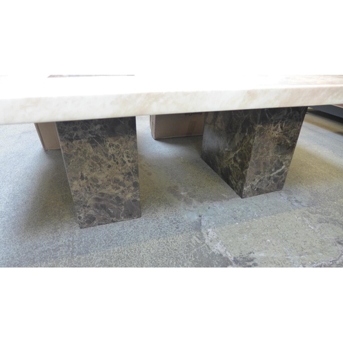 1557 - A marble effect coffee table