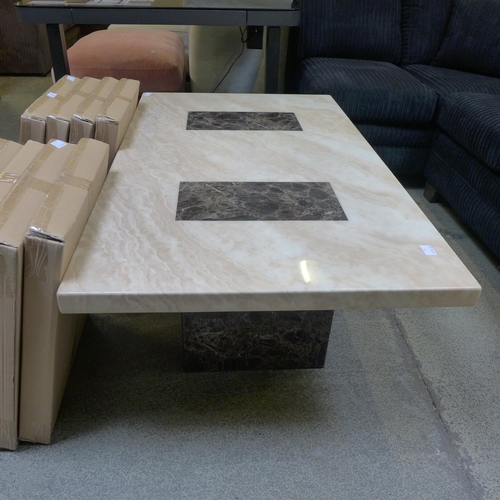 1557 - A marble effect coffee table