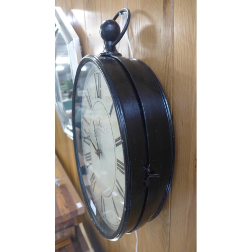 1565 - A double sided hanging clock