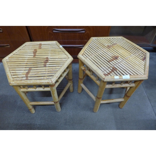 104 - A pair of bamboo hexagonal occasional tables