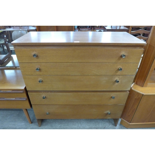 115 - A teak chest of drawers