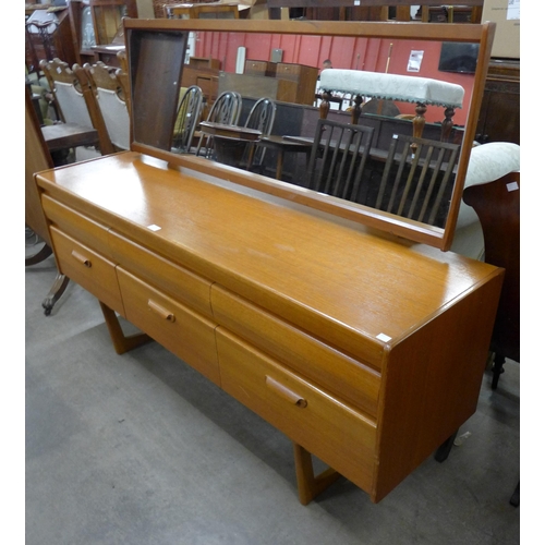 125 - A William Lawrence teak dressing table