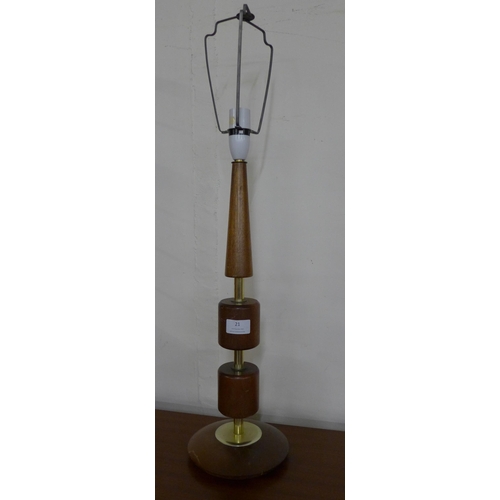 21 - A teak table lamp