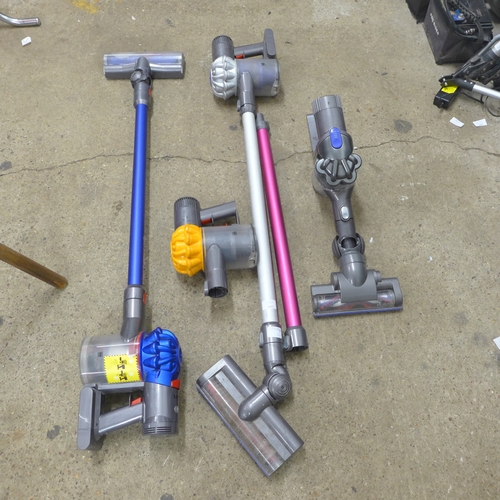 2441 - A collection Dyson cordless vacuum cleaners for spares or repair