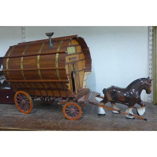 374 - Two porcelain Shire horses with wooden carts