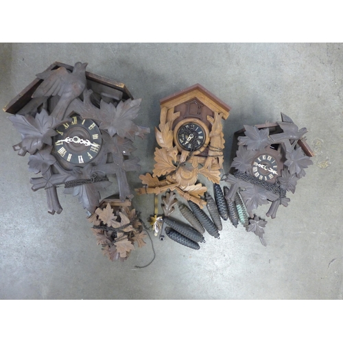 389 - Four vintage Black Forest wall hanging cuckoo clocks