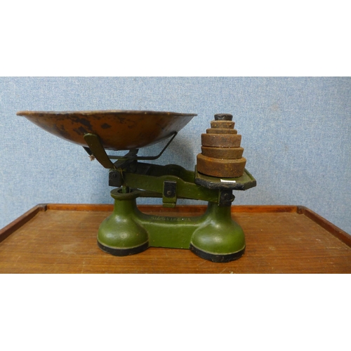 390 - A set of painted cast iron kitchen scales