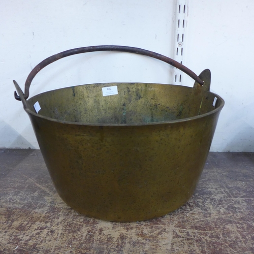 402 - A Victorian brass jam pan