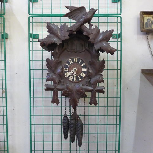 411 - A vintage Black Forest wall hanging musical cuckoo clock