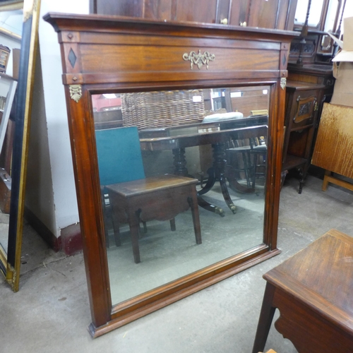 421 - A large French Empire style mahogany and parcel gilt framed mirror