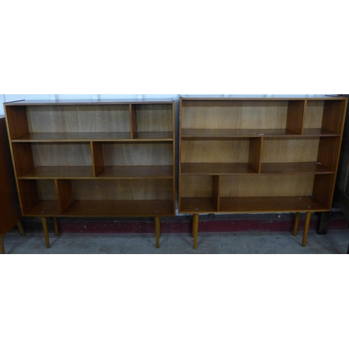 78 - A pair of teak open bookcase