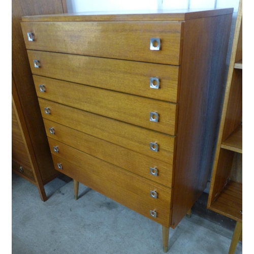 79 - A teak chest of drawers