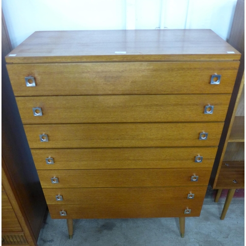 79 - A teak chest of drawers