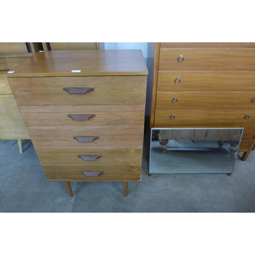 81 - A simulated teak chest of drawers