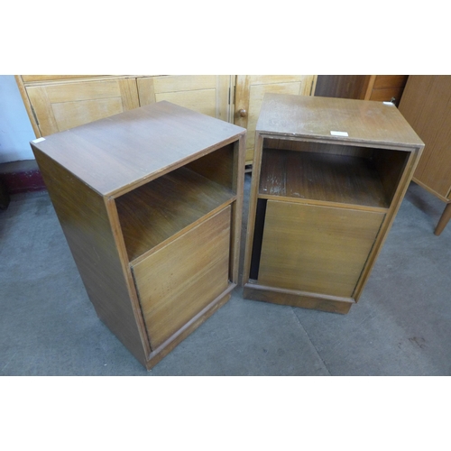 82 - A pair of teak bedside cupboards