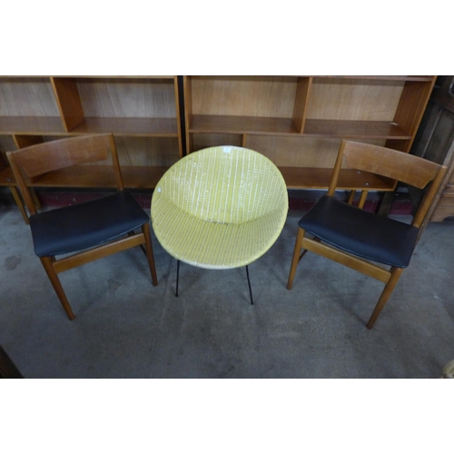 84 - A pair of Danish teak dining chairs and a ball chair