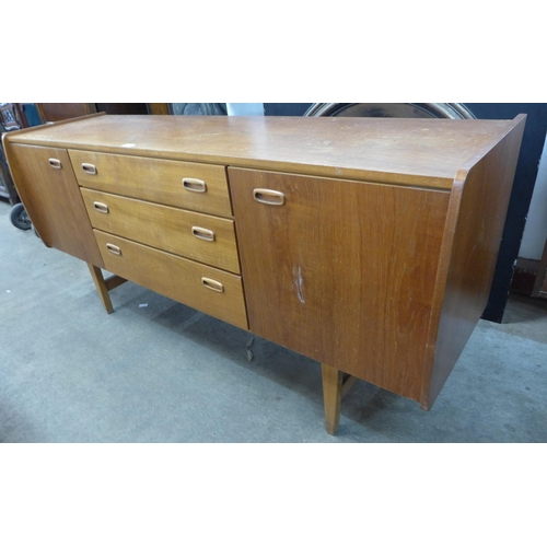 86 - A teak sideboard